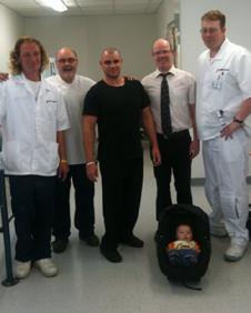 Anthony Booth, his youngest son Harley and the team at Seacroft Hospital