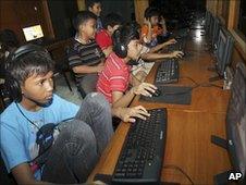 Indonesian youths at an Internet cafe in Jakarta (12 June)