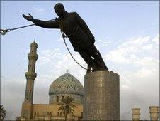 Statue of Saddam Hussein being toppled in Baghdad after the invasion