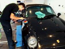 A Porsche 911 being cleaned