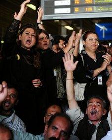 Employees of the flagship Pakistan International Airlines (PIA) chant slogans against the management at the airport in Karachi on February 8, 2011