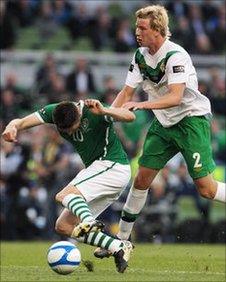 Robbie Keane (left) is fouled by Adam Thompson