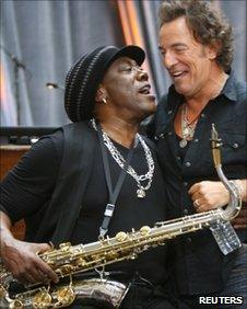 Clarence Clemons (L) grabs Bruce Springsteen during an appearance in New York in September 2007