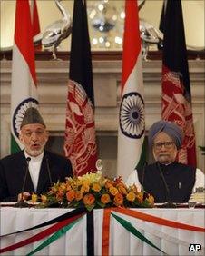 President Hamid Karzai (left) and Indian PM Manmohan Singh