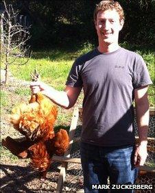 Mark Zuckerberg holding a chicken