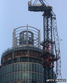 A damaged crane attached to St Georges Wharf Tower a
