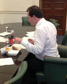 George Osborne eating a burger in Downing Street