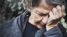Tired, older woman