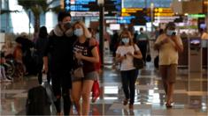 Travellers wear masks at airport