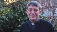 Photo of Fr Simon Chinery in his garden