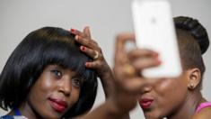 Two Tanzanian women take a selfie