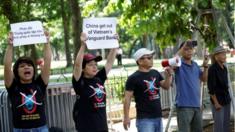 Protester in front of Chinese Embassy in Hanoi
