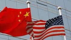 Flags of China (left) and the US. File photo