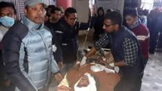 An injured Nepali passenger is transported to a hospital in Dang district, south-west of Kathmandu, on December 22, 2018