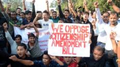 Students shout slongans during a protest against the Citizenship Amendment Bill (CAB) in Guwahati, Assam, India, 11 December 2019