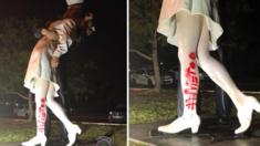 Two images showing graffiti painting on the 'Unconditional Surrender' statue in Florida