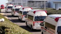 Ambulances arrive at Haneda airport in Tokyo earlier this year