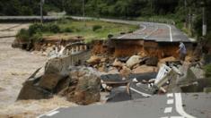 Collapsed road due to heavy rain in Higashihiroshima, Hiroshima prefecture on July 7, 2018