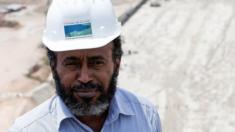 In this file photo taken on March 31, 2015 Chief Engineer Simegnew Bekele poses during a tour of the Grand Renaissance Dam under construction near the Sudanese-Ethiopian border.