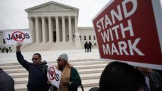 Activists rally in front of the U.S. Supreme Court on February 26, 2018 in Washington, DC.