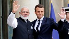 Indian Prime Minister Narendra Modi (L) is greeted by French President Emmanuel Macron (R) on the last leg of his four-nation visit at the Elysee palace in Paris, France, June 3, 2017