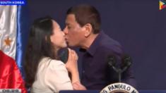 Screenshot of Duterte kissing OFW