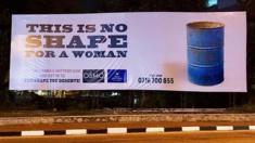 The banner reading 'this is no shape for a woman'