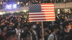 Protesters in Hong Kong with US flag