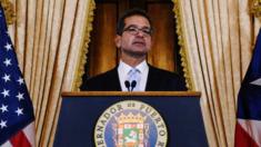 Pedro Pierluisi holds a news conference after being sworn in as governor of Puerto Rico