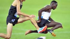 Conseslus Kipruto (R) of Kenya is on his way to win the men"s 3,000m Steeplechase race during the Weltklasse IAAF Diamond League international athletics meeting in Zurich