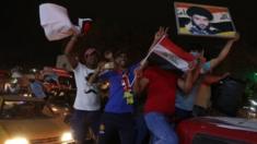 Supporters of Muqtada al-Sadr celebrate in Baghdad, Iraq. Photo: 14 May 2018