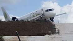A Toronto-bound Fly Jamaica airplane is seen after crash-landing at the Cheddi Jagan International Airport in Georgetown, Guyana on November 9, 2018. -