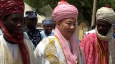 Chinese man in traditional Nigerian dress
