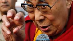 Tibetan spiritual leader, the Dalai Lama, speaks to students at a school in Mumbai, India, 8 December 2017