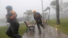 men running through high winds in Puerto Rico