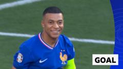 Mbappe scores penalty to put France ahead against Poland