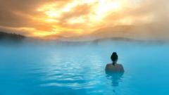 Rear view of a woman standing in the Blue Lagoon, Iceland