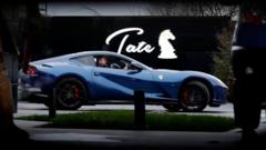 A Romanian law enforcement officer steers a Ferrari sports car of Andrew Tate