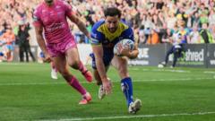 Warrington hold off Hull KR fightback to go top