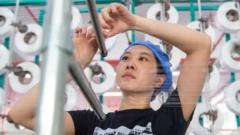 A worker in a textile factory in Haian city, eastern Jiangsu Province, China.