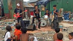 The band play a show for residents of the Phnom Penh neighbourhood they were born