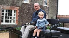 Kensington Palace shared a photograph of Prince George with his great-grandfather Philip, taken by the Duchess of Cambridge