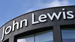 John Lewis allowed to build homes for first time