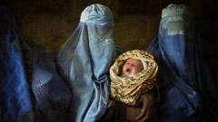 Afghan women in burkas, with baby, illustration