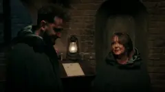 Wilfred and Amanda in the Traitors' cloaks in the turret