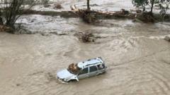 Flooded car seen after heavy rains in Carinthia, Austria