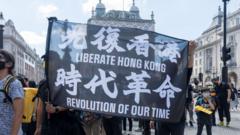 Protestors hold up a banner that says Liberate Hong Kong
