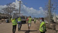 Red Cross volunteers in Tonga carrying out relief works on Sunday in Tonga