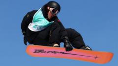 Yiming Su performing a trick during the Big Air event