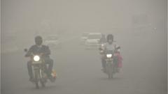Vehicles on the road amid heavy smog on 3 November 2019 in Ghaziabad, India.
